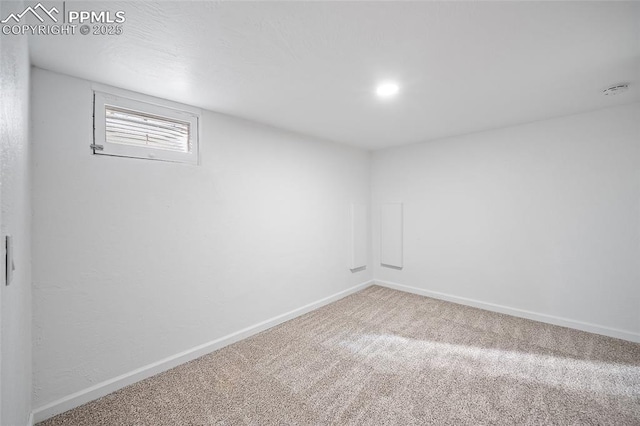 137 N 14th St, Colorado Springs, CO 80904 - below grade area featuring baseboards and carpet flooring