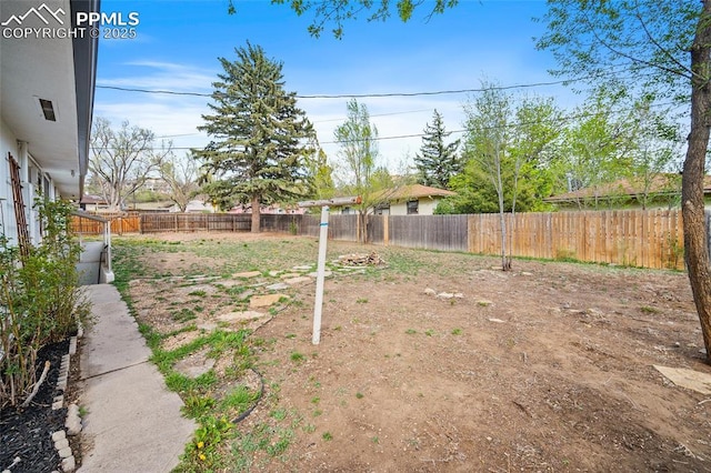 137 N 14th St, Colorado Springs, CO 80904 - view of yard featuring a fenced backyard