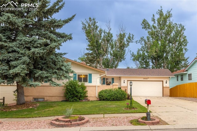 1522 Lehmberg Blvd, Colorado Springs, CO 80915 - view of front of property with concrete driveway and a garage