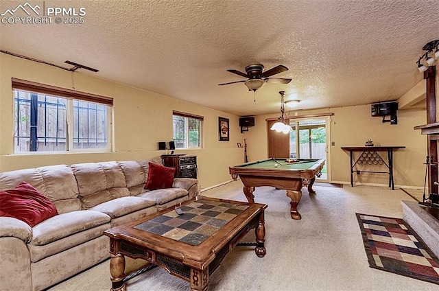 1522 Lehmberg Blvd, Colorado Springs, CO 80915 - game room featuring ceiling fan, billiards table, carpet, healthy amount of natural light, and a textured ceiling
