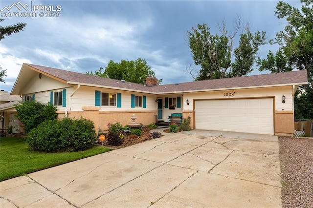 1522 Lehmberg Blvd, Colorado Springs, CO 80915 - single story home with an attached garage, driveway, and a chimney