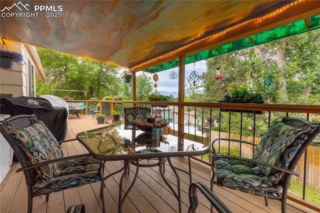 1522 Lehmberg Blvd, Colorado Springs, CO 80915 - wooden terrace with outdoor dining area and area for grilling
