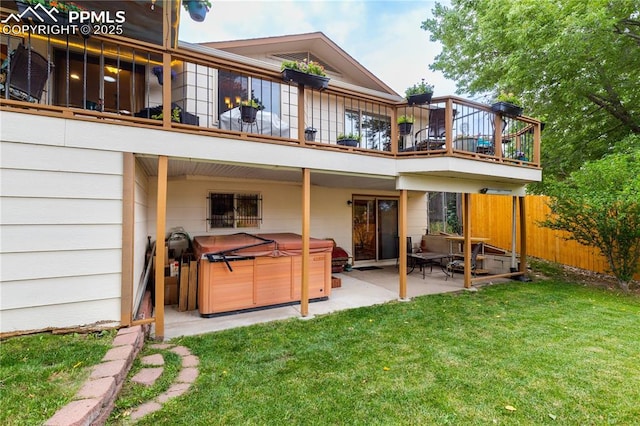 1522 Lehmberg Blvd, Colorado Springs, CO 80915 - rear view of property with a hot tub, a patio, and a balcony