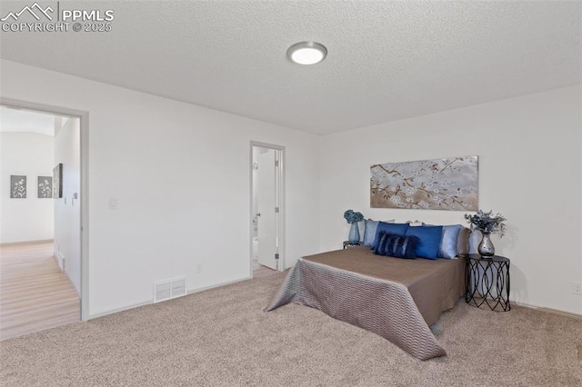 929 Bromefield Dr, Fountain, CO 80817 - carpeted bedroom with a textured ceiling and visible vents