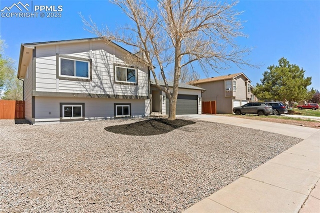 929 Bromefield Dr, Fountain, CO 80817 - split level home with fence, an attached garage, and driveway