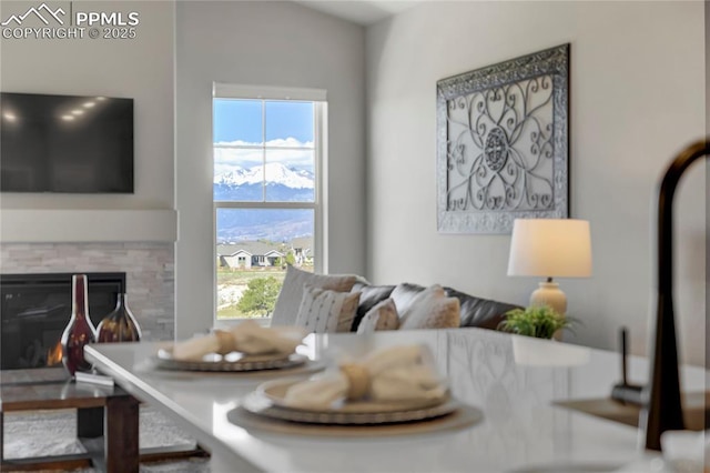 9484 Simper Hts, Colorado Springs, CO 80924 - dining room featuring a glass covered fireplace