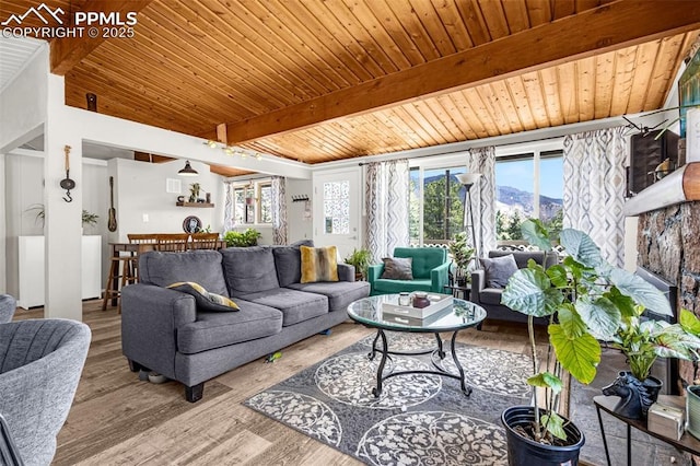 living room with wooden ceiling, beam ceiling, and wood finished floors
