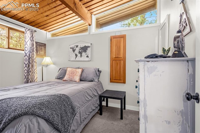 bedroom with carpet floors, wood ceiling, baseboards, and vaulted ceiling