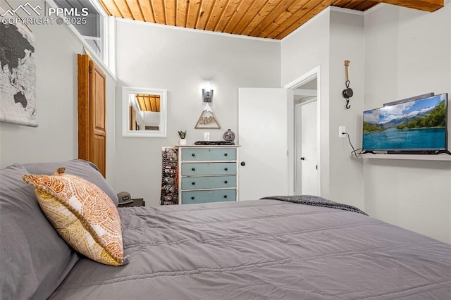 bedroom featuring wooden ceiling and ornamental molding