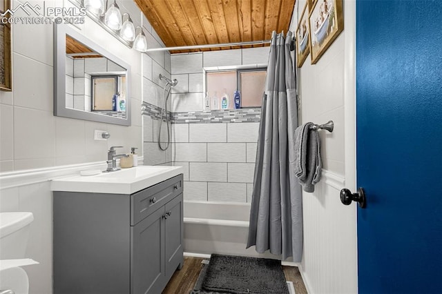 bathroom featuring shower / bathtub combination with curtain, toilet, wooden ceiling, and vanity