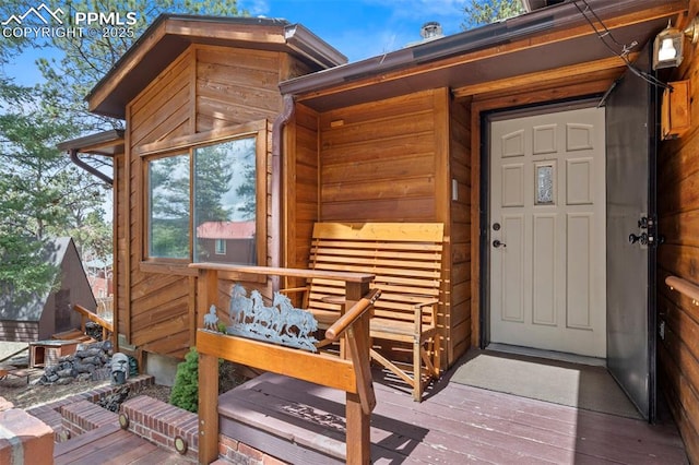 1200 Forest Edge Rd, Woodland Park, CO 80863 - entrance to property with a wooden deck