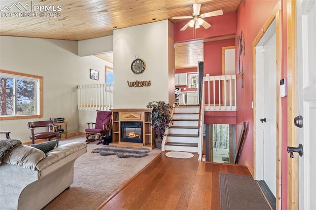1200 Forest Edge Rd, Woodland Park, CO 80863 - living area with a healthy amount of sunlight, wood finished floors, and wood ceiling