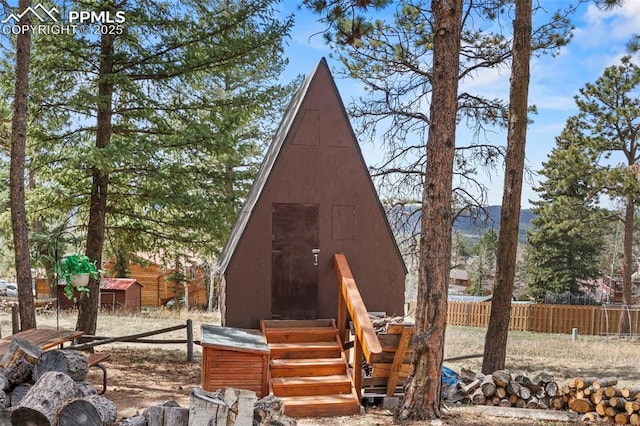 1200 Forest Edge Rd, Woodland Park, CO 80863 - view of shed featuring fence