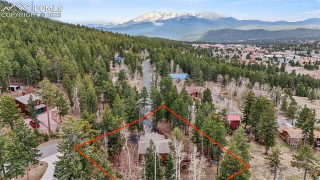 1200 Forest Edge Rd, Woodland Park, CO 80863 - bird's eye view featuring a mountain view and a forest view