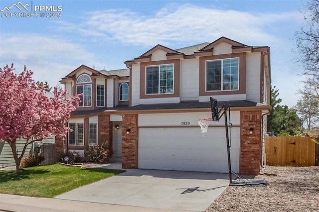 7820 Curlew Ct, Colorado Springs, CO 80920 - traditional-style house featuring fence, an attached garage, driveway, and brick siding