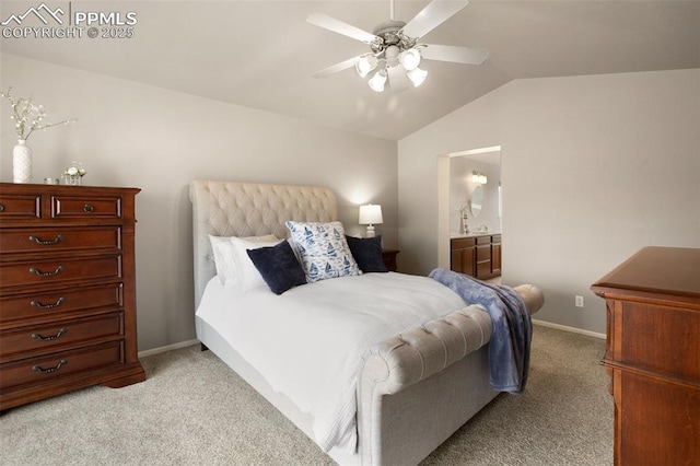 7820 Curlew Ct, Colorado Springs, CO 80920 - bedroom featuring baseboards, light colored carpet, ensuite bathroom, and vaulted ceiling