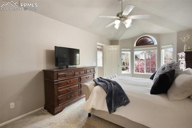 7820 Curlew Ct, Colorado Springs, CO 80920 - bedroom with baseboards, multiple windows, vaulted ceiling, and light colored carpet