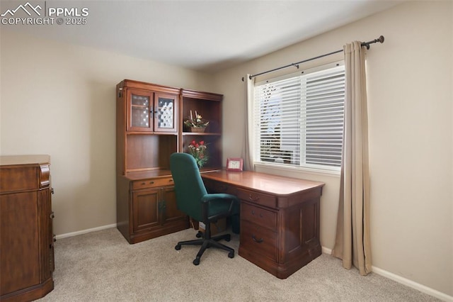 7820 Curlew Ct, Colorado Springs, CO 80920 - home office with baseboards and light colored carpet