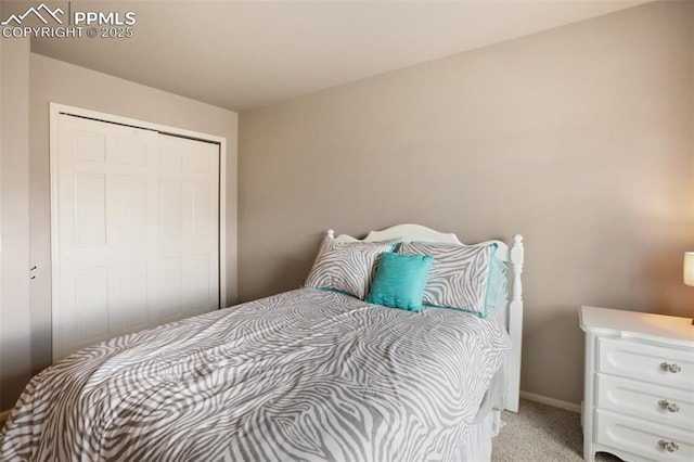 7820 Curlew Ct, Colorado Springs, CO 80920 - bedroom featuring light colored carpet, baseboards, and a closet