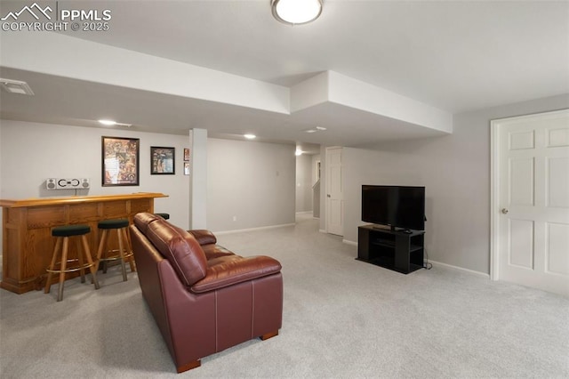 7820 Curlew Ct, Colorado Springs, CO 80920 - living area featuring baseboards, visible vents, a bar, and light colored carpet