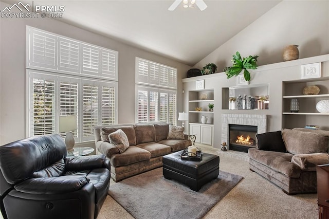 7820 Curlew Ct, Colorado Springs, CO 80920 - carpeted living area featuring high vaulted ceiling, ceiling fan, and a fireplace