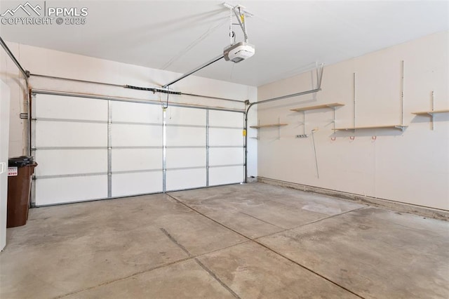 garage featuring a garage door opener