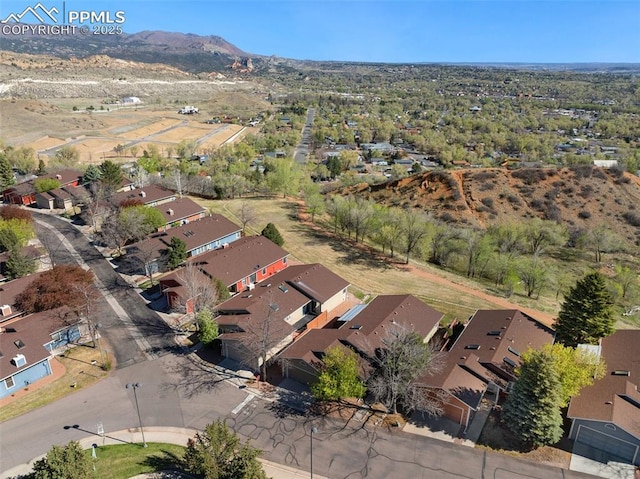 bird's eye view with a residential view and a mountain view