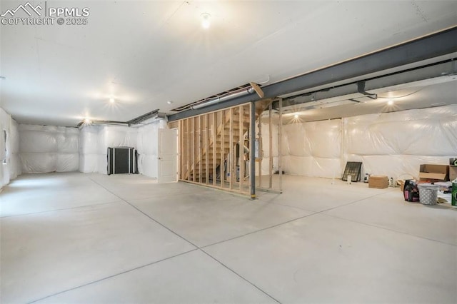 unfinished basement with stairs