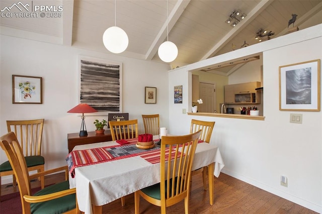 500 W Kellys Rd, Woodland Park, CO 80863 - dining area featuring wood finished floors, baseboards, and wood ceiling