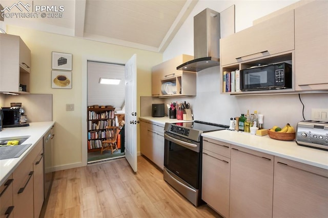 500 W Kellys Rd, Woodland Park, CO 80863 - kitchen with stainless steel appliances, extractor fan, light wood finished floors, and light countertops