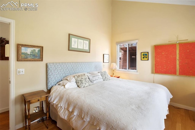500 W Kellys Rd, Woodland Park, CO 80863 - bedroom with wood finished floors and baseboards