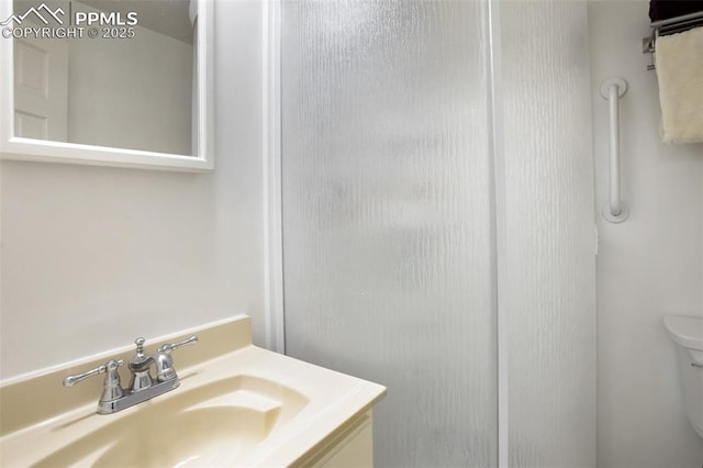 500 W Kellys Rd, Woodland Park, CO 80863 - bathroom with toilet, vanity, and a shower stall
