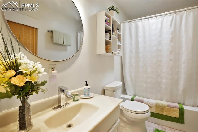 500 W Kellys Rd, Woodland Park, CO 80863 - bathroom with vanity, shower / bath combo with shower curtain, toilet, and tile patterned flooring