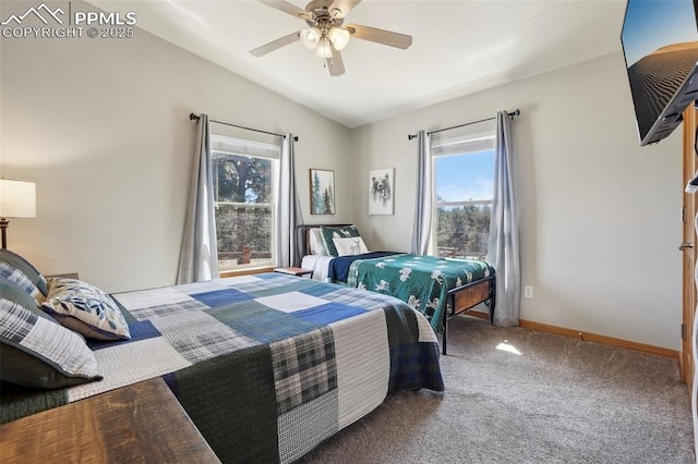 bedroom featuring carpet floors, baseboards, vaulted ceiling, and ceiling fan