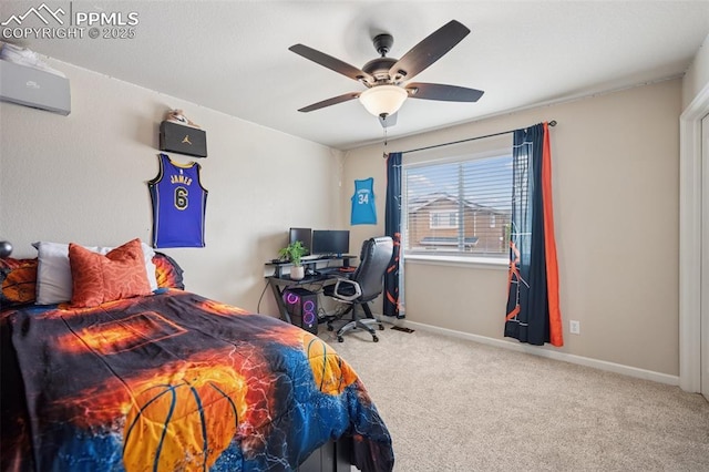 carpeted bedroom featuring a ceiling fan and baseboards