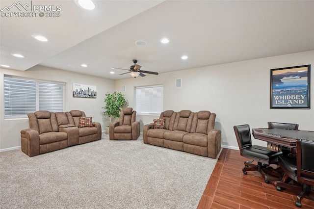 living room with visible vents, wood finished floors, baseboards, ceiling fan, and recessed lighting