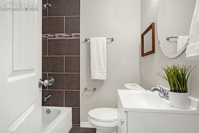 bathroom with toilet, shower / bath combination, and vanity