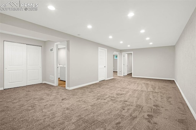 basement with carpet flooring, recessed lighting, and baseboards