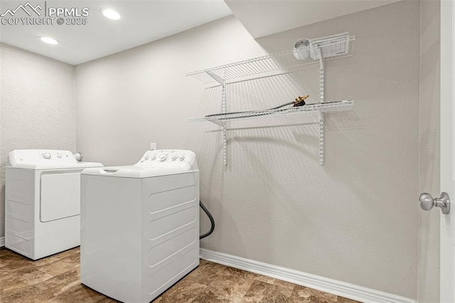 laundry area with laundry area, recessed lighting, baseboards, and independent washer and dryer