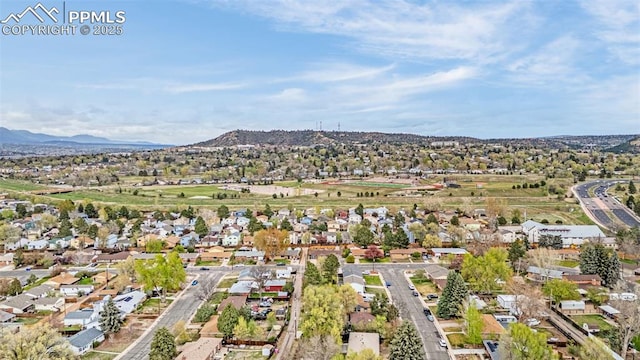 bird's eye view with a residential view and a mountain view