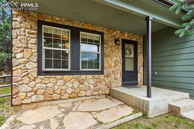 133 Wheat Ridge St, Palmer Lake, CO 80133 - entrance to property featuring stone siding