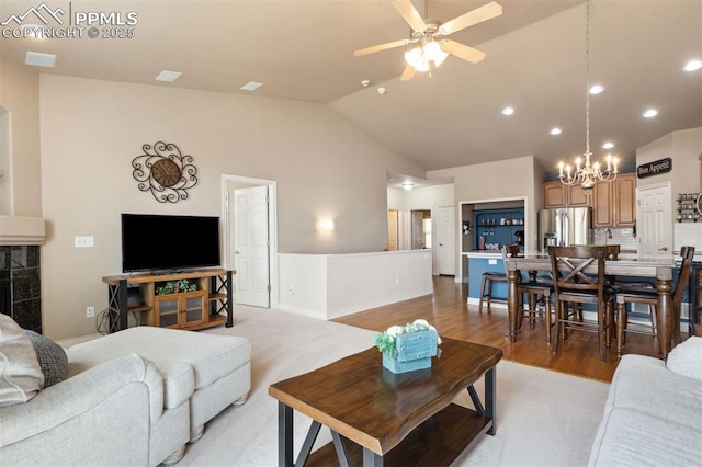 8492 Artesian Springs Pt, Colorado Springs, CO 80920 - living area with a chandelier, a ceiling fan, recessed lighting, baseboards, and high vaulted ceiling