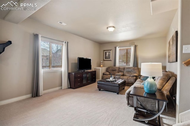 8492 Artesian Springs Pt, Colorado Springs, CO 80920 - living area featuring baseboards and light carpet