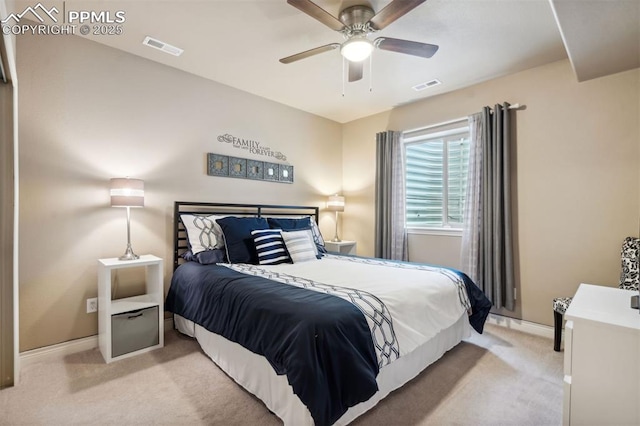 8492 Artesian Springs Pt, Colorado Springs, CO 80920 - bedroom with light carpet, baseboards, and ceiling fan