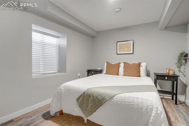 720 S Prospect St, Colorado Springs, CO 80903 - bedroom with baseboards and wood finished floors