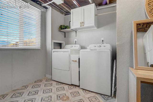 720 S Prospect St, Colorado Springs, CO 80903 - clothes washing area featuring washer and dryer and cabinet space