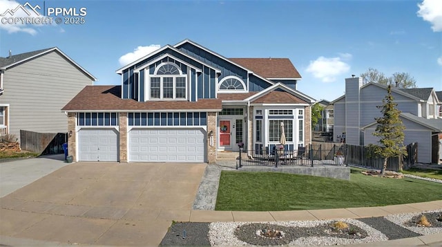 9025 Rochester Dr, Colorado Springs, CO 80920 - view of front of house with concrete driveway, roof with shingles, brick siding, and a garage
