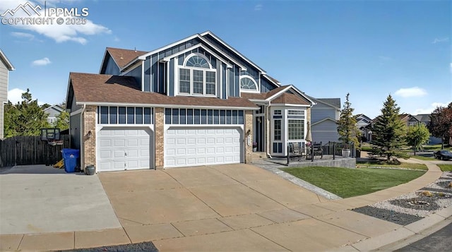9025 Rochester Dr, Colorado Springs, CO 80920 - view of front facade with concrete driveway, brick siding, a garage, and roof with shingles