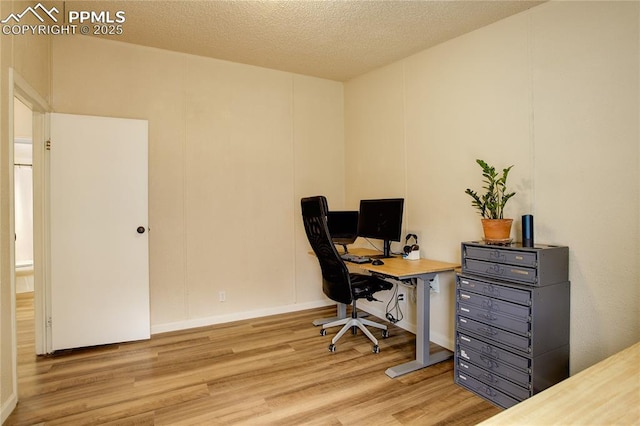 455 Clio Ave, Palmer Lake, CO 80133 - office featuring wood finished floors and a textured ceiling