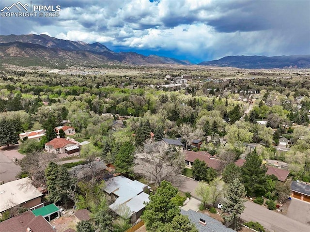 drone / aerial view with a residential view and a mountain view